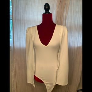 White body suit cape.